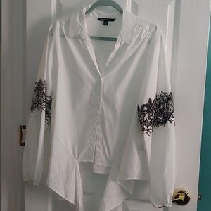 White, button down long sleeve shirt.